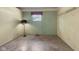 Bedroom features neutral carpet, laminate walls and a lamp at 406 W Mcgregor Rd, Indianapolis, IN 46217