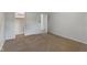 This bedroom has neutral carpet, a closet, and an adjoining room at 406 W Mcgregor Rd, Indianapolis, IN 46217