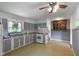 Classic kitchen with tile flooring, and cabinetry, offering functionality and charm at 406 W Mcgregor Rd, Indianapolis, IN 46217
