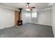 Comfortable living room boasts a wood-burning stove, carpet flooring, and ample space at 406 W Mcgregor Rd, Indianapolis, IN 46217
