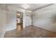 Versatile room with tile flooring, neutral walls, with a glimpse into the adjoining kitchen at 406 W Mcgregor Rd, Indianapolis, IN 46217