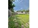 Lush green backyard featuring a play set and lawn at 419 N 14Th Ave, Beech Grove, IN 46107