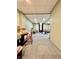 Large basement area with neutral carpet, ceiling tiles, and various play items throughout at 419 N 14Th Ave, Beech Grove, IN 46107