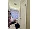 Cozy bathroom featuring a shower, toilet, and decorative floral curtain at 419 N 14Th Ave, Beech Grove, IN 46107