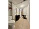 Bathroom featuring tile flooring, vanity with cabinet, and shower with curtain at 419 N 14Th Ave, Beech Grove, IN 46107
