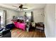 Spacious bedroom featuring a bunk bed, hardwood floors, and ceiling fan at 419 N 14Th Ave, Beech Grove, IN 46107