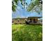 Charming home with manicured lawn and mature trees at 419 N 14Th Ave, Beech Grove, IN 46107