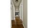 Hallway with hardwood floors, coat rack and storage space at 419 N 14Th Ave, Beech Grove, IN 46107