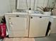 White Maytag washer and dryer set ready to take care of all your laundry needs at 419 N 14Th Ave, Beech Grove, IN 46107