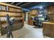 Basement office featuring storage, desk space, and exercise machine for convenience at 421 Kingsway Ct, Mooresville, IN 46158