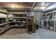 Spacious unfinished basement offering ample storage and potential for customization at 421 Kingsway Ct, Mooresville, IN 46158