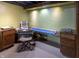 Office in finished basement with desk, chair, cabinetry, and ample workspace at 421 Kingsway Ct, Mooresville, IN 46158