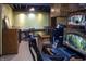 Finished basement with ample storage, bright lighting, and functional office space at 421 Kingsway Ct, Mooresville, IN 46158