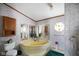 Relaxing bathroom featuring unique decor and a jetted bathtub at 4697 W Ridge Dr, Columbus, IN 47203