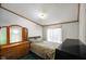 Bedroom with standard decor featuring a queen bed, dresser, and a window at 4697 W Ridge Dr, Columbus, IN 47203