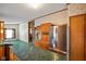 Open concept kitchen with stainless steel appliances and marble countertops at 4697 W Ridge Dr, Columbus, IN 47203