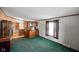 Cozy living area with natural light through a window and wood cabinets at 4697 W Ridge Dr, Columbus, IN 47203