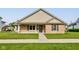 Charming single-story brick home with a well-manicured lawn and inviting front porch at 524 S Meridian S St, Lebanon, IN 46052