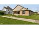Attractive brick house with a covered front porch and well-maintained grassy yard at 524 S Meridian S St, Lebanon, IN 46052