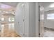 Hallway with views of living room and another room with gray floors at 524 S Meridian S St, Lebanon, IN 46052