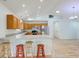 Bright, open kitchen with a breakfast bar, stainless appliances, and recessed lighting at 524 S Meridian S St, Lebanon, IN 46052