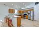 Inviting kitchen featuring stainless steel appliances, light wood cabinetry, and a convenient breakfast bar at 524 S Meridian S St, Lebanon, IN 46052