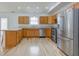 Updated kitchen with stainless steel appliances, generous counter space, and modern cabinetry at 524 S Meridian S St, Lebanon, IN 46052