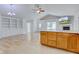 Open-concept living room with hardwood floors and a fireplace at 524 S Meridian S St, Lebanon, IN 46052