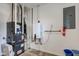 Utility room featuring furnace, water heater, and electrical panel at 524 S Meridian S St, Lebanon, IN 46052