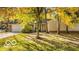 Inviting one-story home with mature trees and manicured lawn, offering great curb appeal at 5303 Windridge Dr # 172, Indianapolis, IN 46226