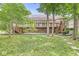 Expansive deck offering views of the lush backyard and mature trees at 545 Pitney Dr, Noblesville, IN 46062