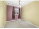 Clean bedroom with neutral carpet, yellow and purple walls, one window, and overhead lighting at 545 Pitney Dr, Noblesville, IN 46062