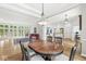 Elegant dining area featuring an oval table, stylish chairs, and bright natural light at 545 Pitney Dr, Noblesville, IN 46062