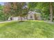Charming single-story brick home with a well-manicured lawn and mature trees at 545 Pitney Dr, Noblesville, IN 46062