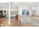 Elegant foyer with hardwood floors, high ceilings, and a staircase leading to the upper level at 545 Pitney Dr, Noblesville, IN 46062