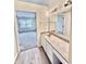 Well-lit bathroom featuring a vanity with ample counter space and a view into the adjacent bedroom at 6027 Crystal View Dr, Indianapolis, IN 46237