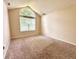 Sun-filled bedroom with neutral walls and plush carpet at 6027 Crystal View Dr, Indianapolis, IN 46237