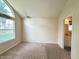 Spacious bedroom featuring an arched window and en-suite bathroom at 6027 Crystal View Dr, Indianapolis, IN 46237
