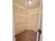 Walk-in closet with installed shelving providing ample storage space at 6027 Crystal View Dr, Indianapolis, IN 46237