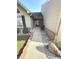 Covered front entrance with a walkway, featuring decorative stone accents and vinyl siding at 6027 Crystal View Dr, Indianapolis, IN 46237
