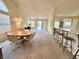 Bright living room with open layout, carpet, neutral colors, and ceiling fan at 6027 Crystal View Dr, Indianapolis, IN 46237