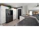 Modern kitchen featuring stainless steel appliances, white cabinets, and grey countertops at 648 Shakespeare Dr, Avon, IN 46123