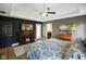 Comfortable main bedroom features a fireplace, television, and access to ensuite bathroom at 648 Shakespeare Dr, Avon, IN 46123