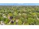An aerial view of this property in its lush, green, and mature neighborhood at 703 Chapel Hill W Dr, Indianapolis, IN 46214