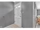 Inviting entryway featuring neutral paint and a white front door at 703 Chapel Hill W Dr, Indianapolis, IN 46214