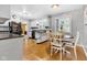 Clean and modern kitchen features white cabinets and updated appliances at 703 Chapel Hill W Dr, Indianapolis, IN 46214