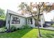 A well maintained backyard featuring a cozy patio and beautiful landscaping that enhances outdoor living at 7686 Micawber Ct, Indianapolis, IN 46256