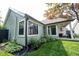 Well maintained backyard featuring a cozy covered patio and beautiful landscaping that enhances outdoor living at 7686 Micawber Ct, Indianapolis, IN 46256
