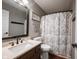 Clean bathroom with a decorative shower curtain at 7686 Micawber Ct, Indianapolis, IN 46256