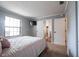 This bedroom has an ensuite bathroom and offers plenty of closet space at 7686 Micawber Ct, Indianapolis, IN 46256